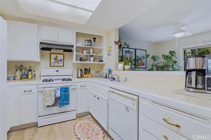 Kitchen with new vinyl plank flooring.