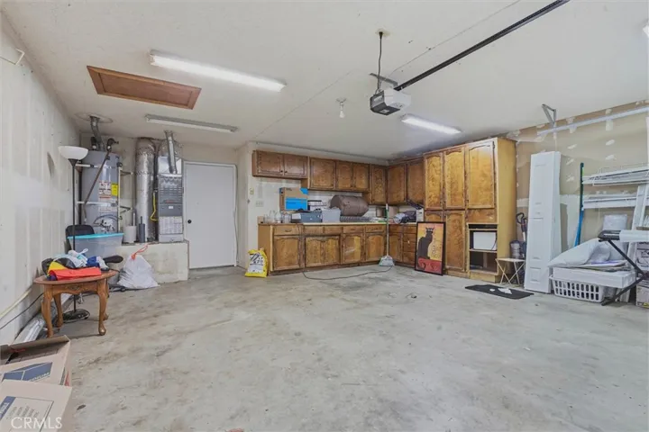 Two car garae with lots of built in storage.  Door leads to laundry room.