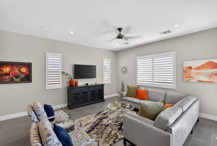 Living Room with White Shutters.