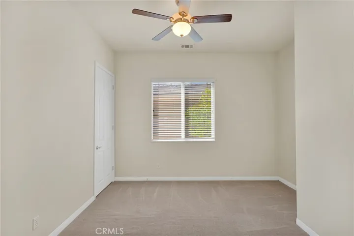 Den / Office Area With a Closet