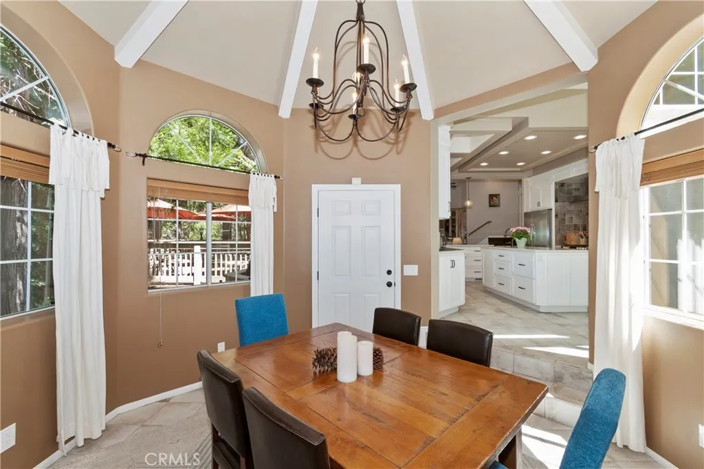 Dining opens to rear deck and kitchen!!