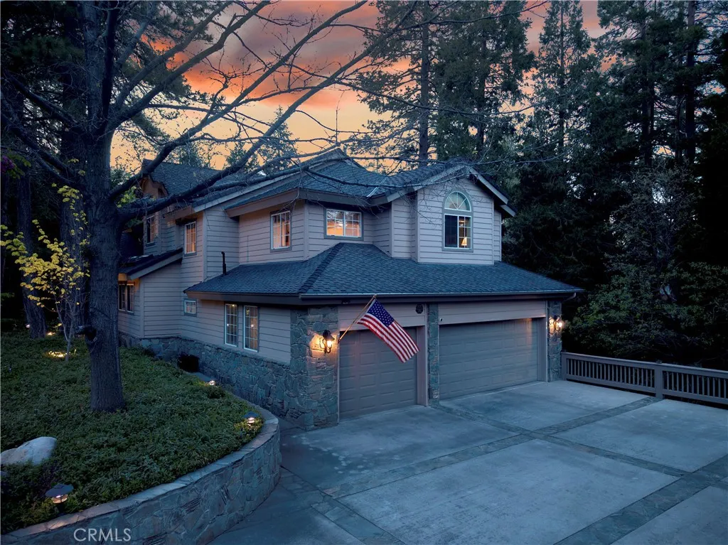 Street level driveway direct to 3-car garage.