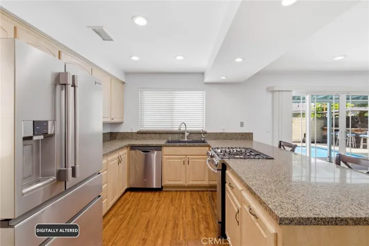 Updated Kitchen with Granite Counters, upgraded Cabinets and stainless steel appliances