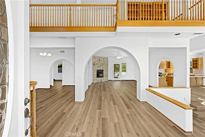 Foyer of home looking into several rooms. Open floorplan living.