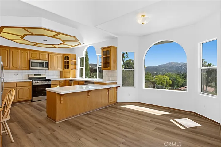 Dinette and Kitchen with breakfast bar area.