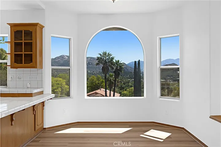 Dinette view with more large windows.