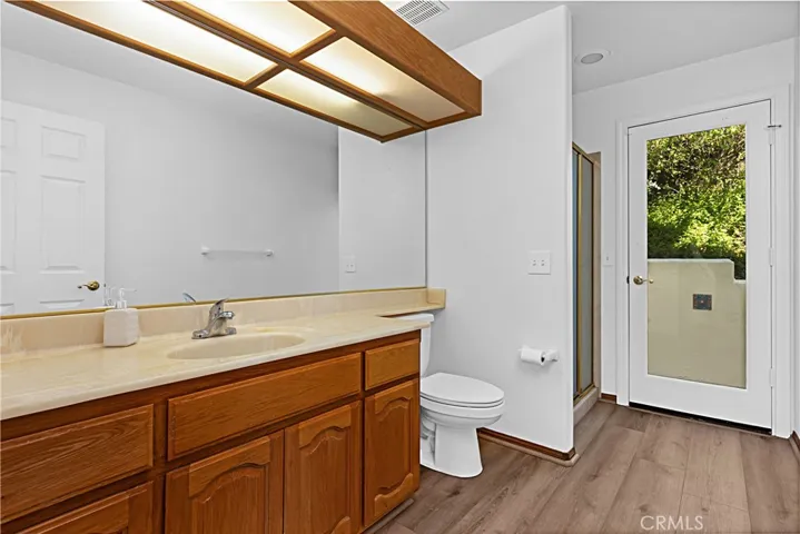 Downstairs bathroom with shower. Door for outdoor pool access.