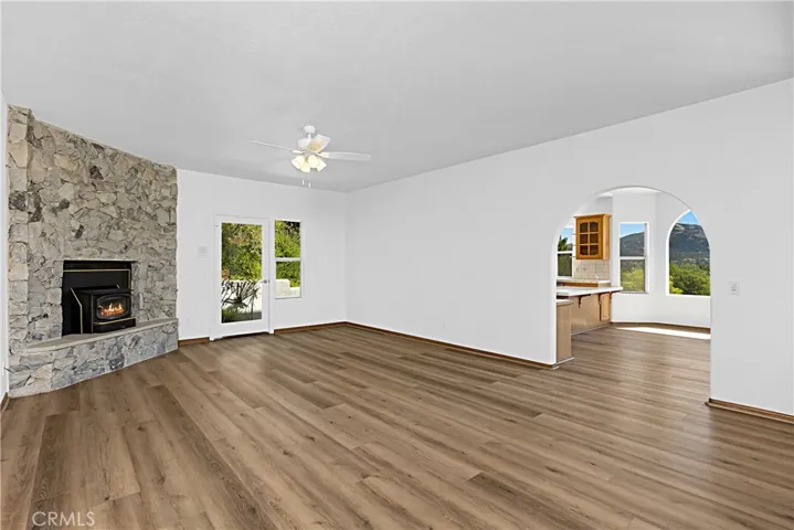 Family room/Den with stone fireplace.