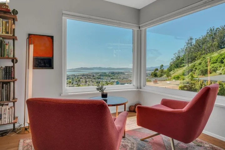 Living area with wood finished floors and a mountain view