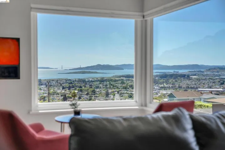 Living area featuring a water and mountain view