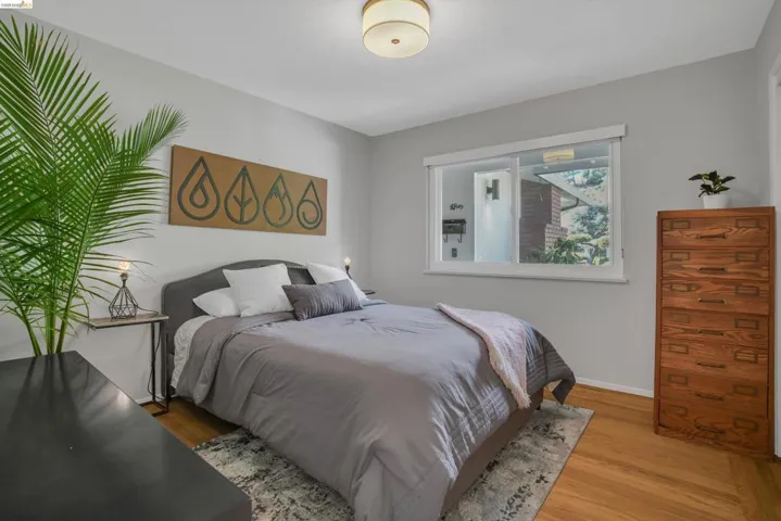 Bedroom with wood finished floors
