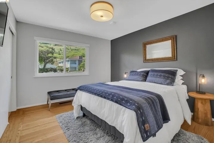 Bedroom featuring light wood-style flooring