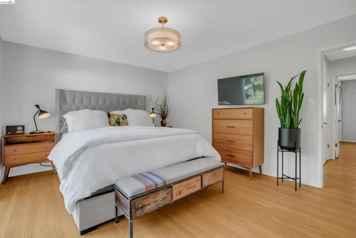 Bedroom with light wood-style floors
