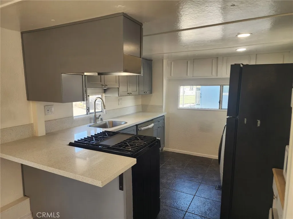 remodeled kitchen with quartz countertops