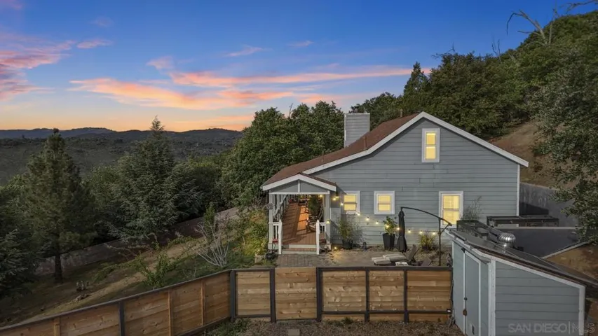 Fully fenced 3.89 acre property with owned solar, back up batteries and whole house generator