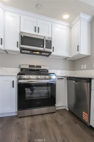 New stainless gas stove/oven, new stainless microwave and new stainless dishwasher