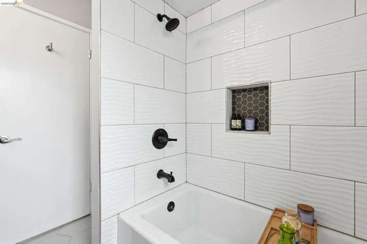 Full bathroom with shower / bath combination