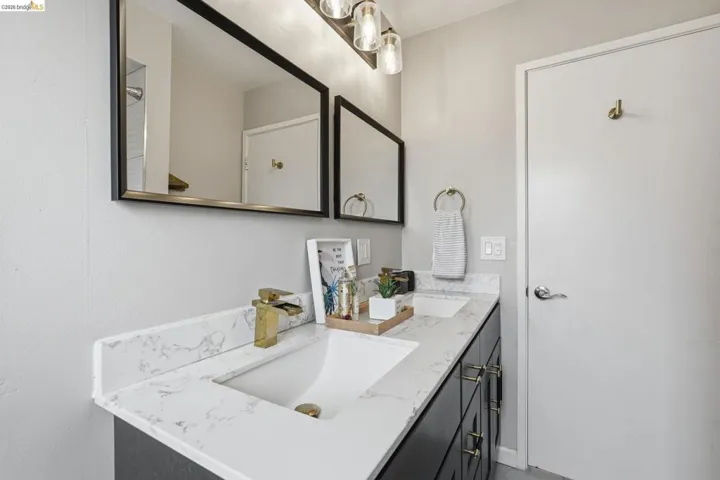 Full bathroom with double vanity