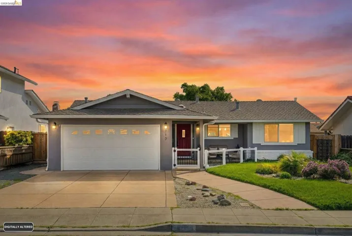 Single story home with an attached garage, concrete driveway, a shingled roof, a chimney, and stucco siding