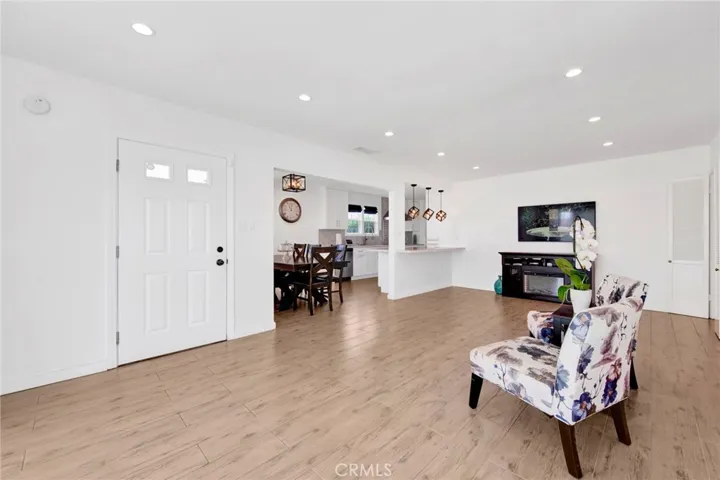 Open to dining and kitchen area.
