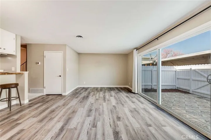 Family Room that looks out to Relaxing Back Patio area