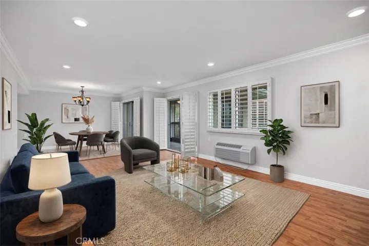 Beautiful and spacious living room loolks oiut over the panoramic views. virtually staged