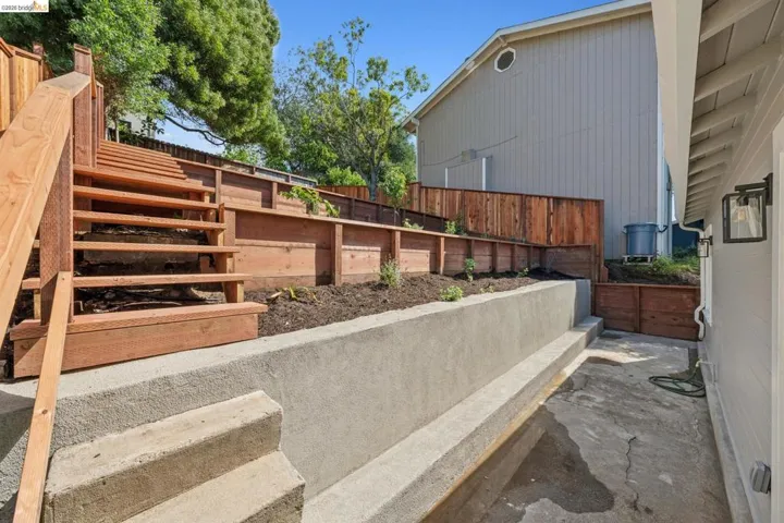 View of yard featuring stairway