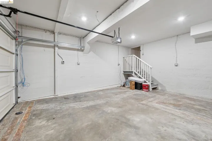 Garage featuring a garage door opener