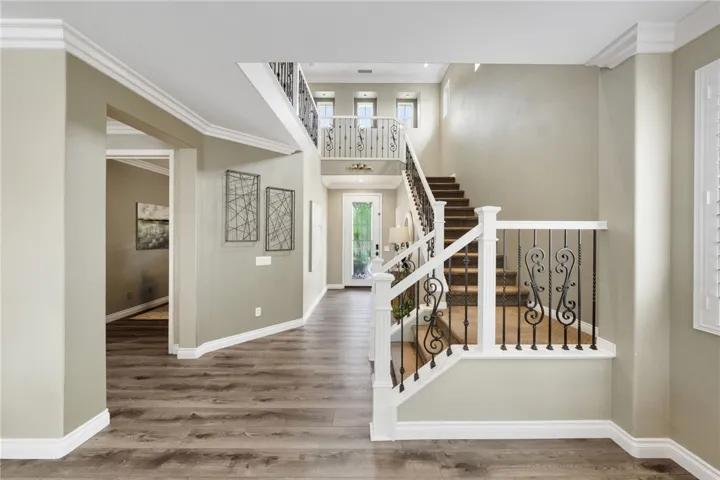 Another view of entry and peek-a-boo of main floor office (potential bedroom #5)