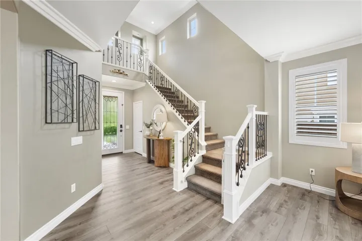 Formal entry with 2 story ceilings