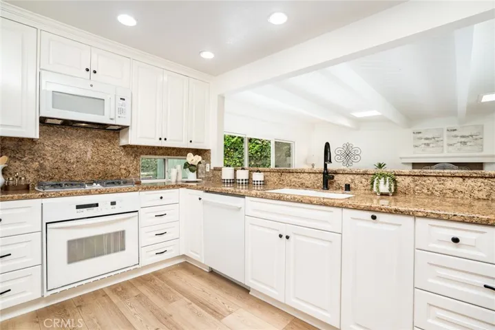 This upgraded kitchen is in the "heart" of the home!
