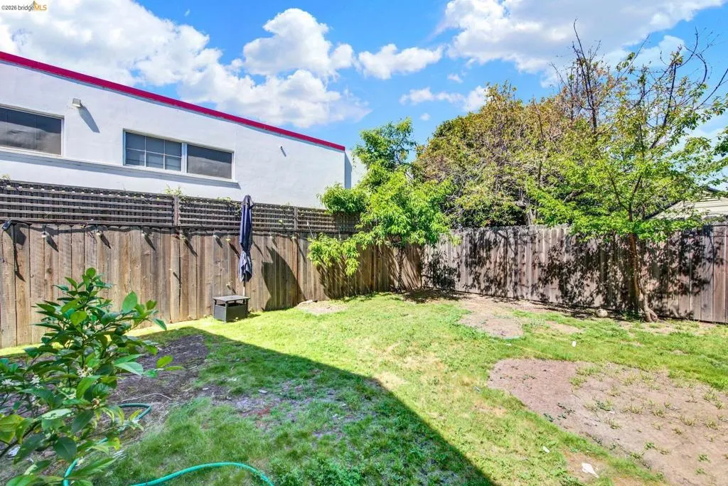 View of fenced backyard