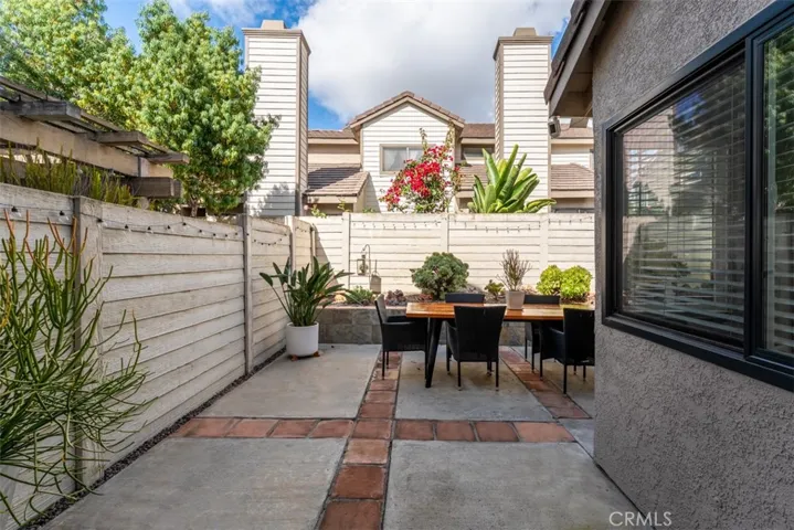Wrap around backyard with privacy fence and new windows throughout