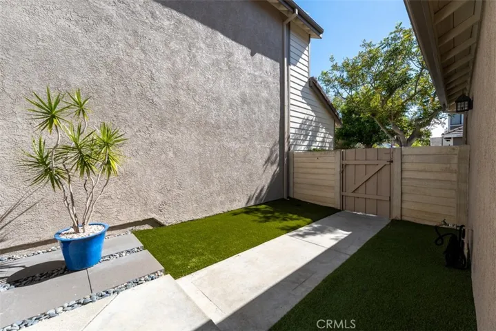 Private entrance - wraps around to backyard.