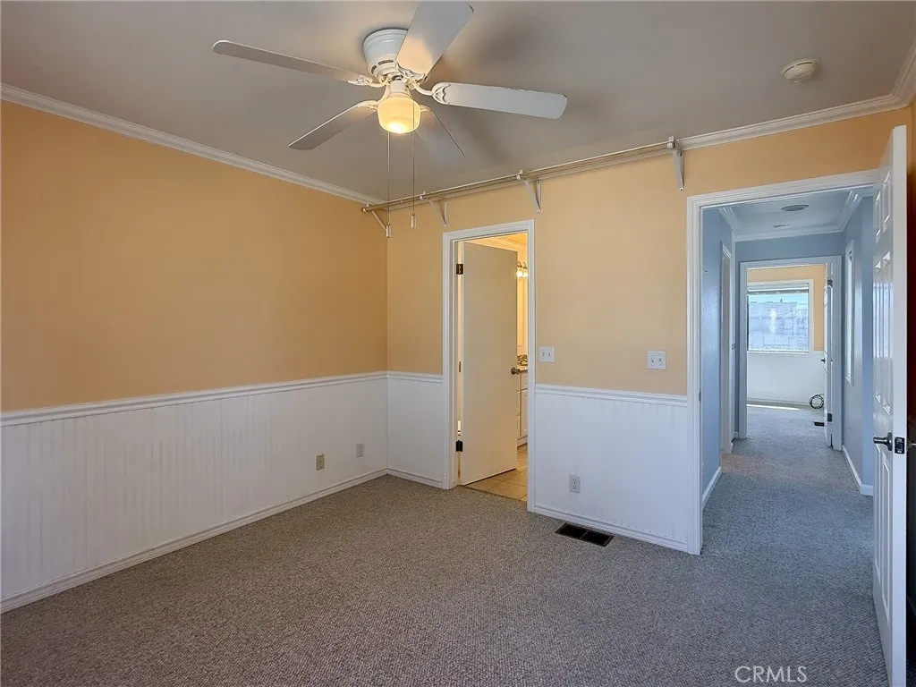 View down the hall to bedroom #2.