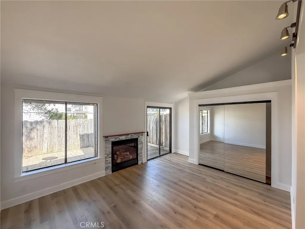 The downstairs area may function as the main living room or as a private suite for an aging parent or guest.