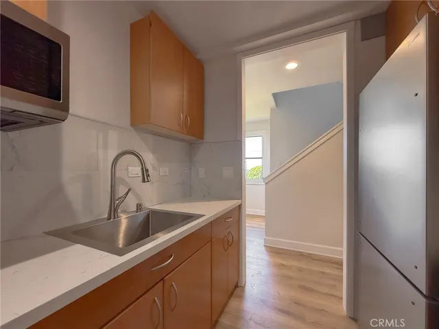 The kitchen features a redesigned European-inspired, space-efficient design.