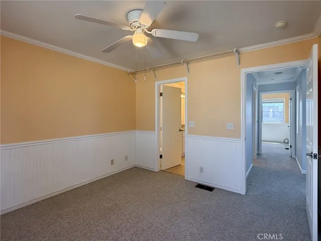 View down the hall to bedroom #2.