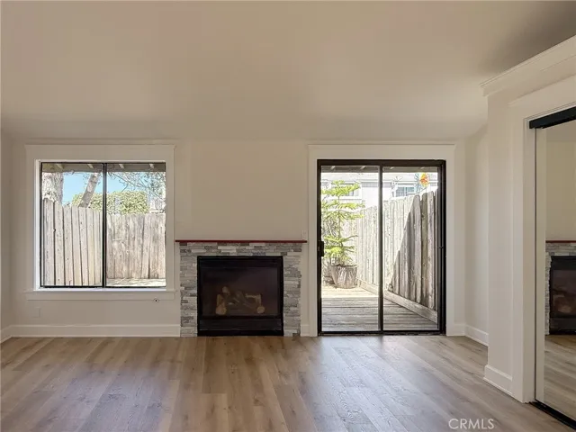 Sliding glass door opens to the back deck patio.