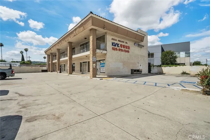 19254 E Walnut Drive two story retail and office in high visibility area off 60 freeway.