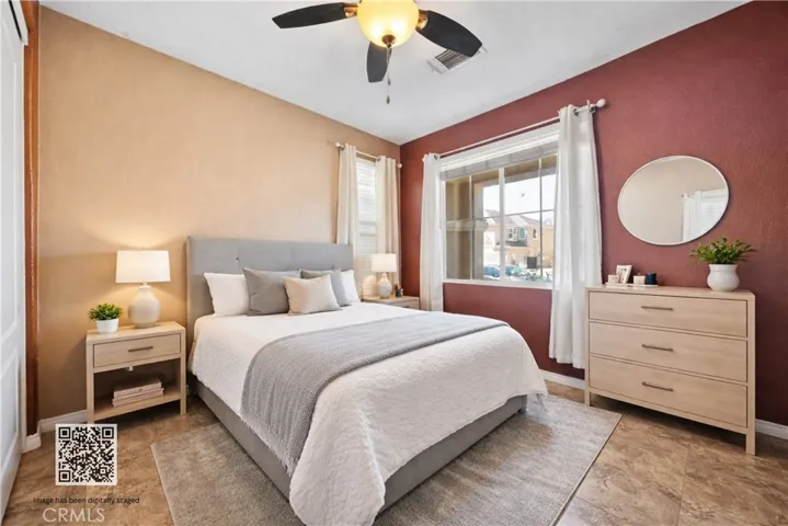 Digitally staged downstairs bedroom