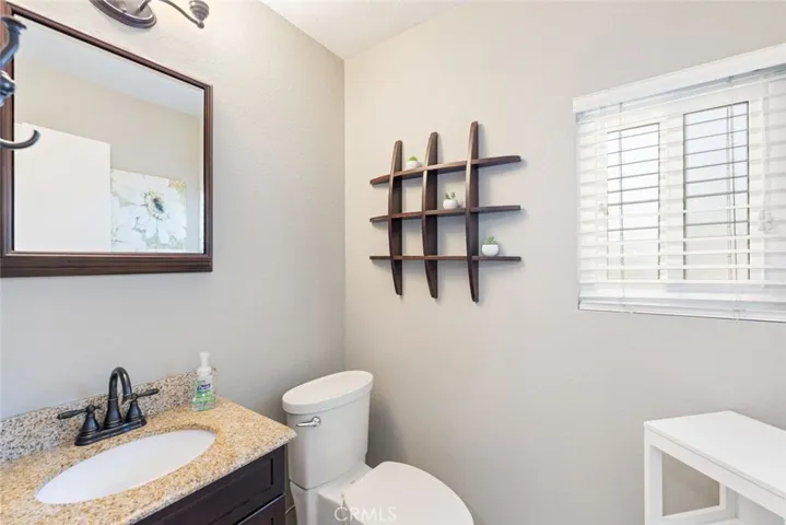 Extra half bath by kitchen and laundry room area
