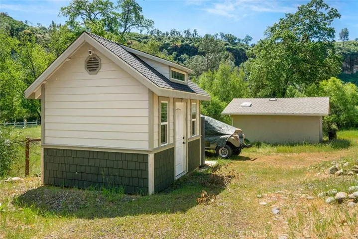 Newer well house at end of driveway
