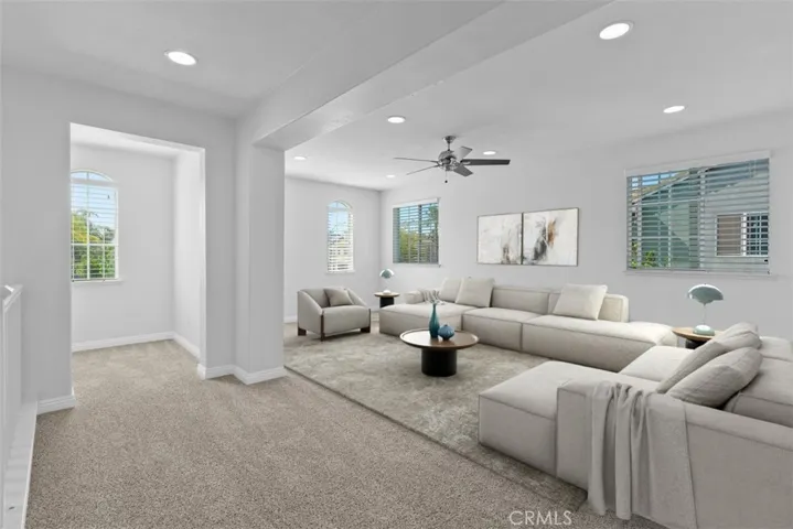 This image has been digitally staged for marketing purposes. Spacious upstairs bonus room.