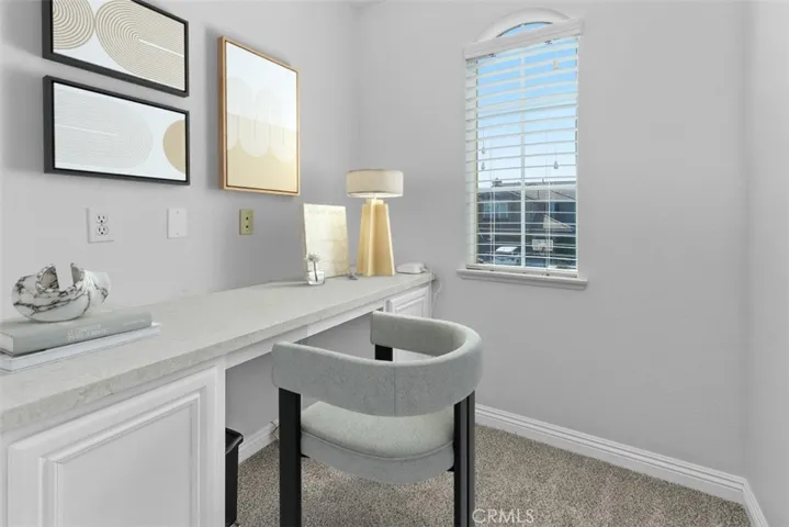 This image has been digitally staged for marketing purposes. Upstairs workspace. digitally staged for marketing purposes.