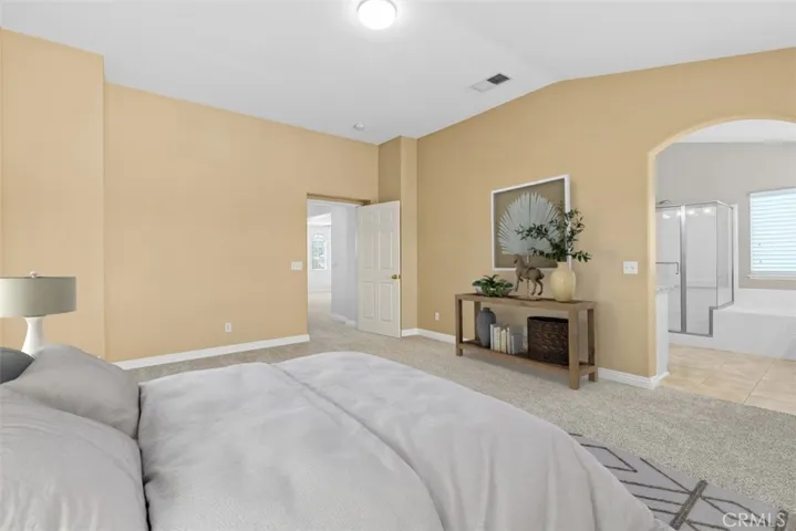 Large Primary Bedroom. This image has been digitally staged for marketing purposes.