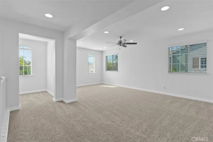 Spacious upstairs bonus room and designated workspace