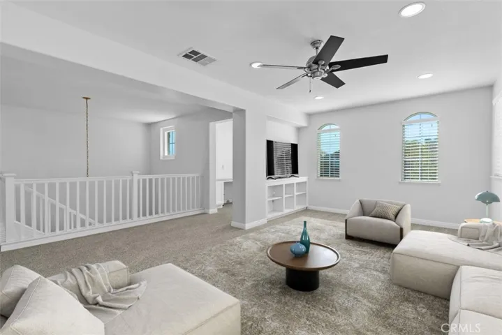 This image has been digitally staged for marketing purposes. Spacious upstairs bonus room.