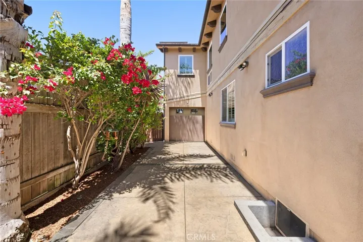 Side Yard Featuring Pass Through from Garage