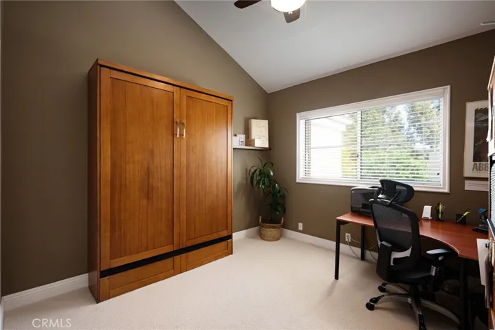 Additional guest bedroom located upstairs.